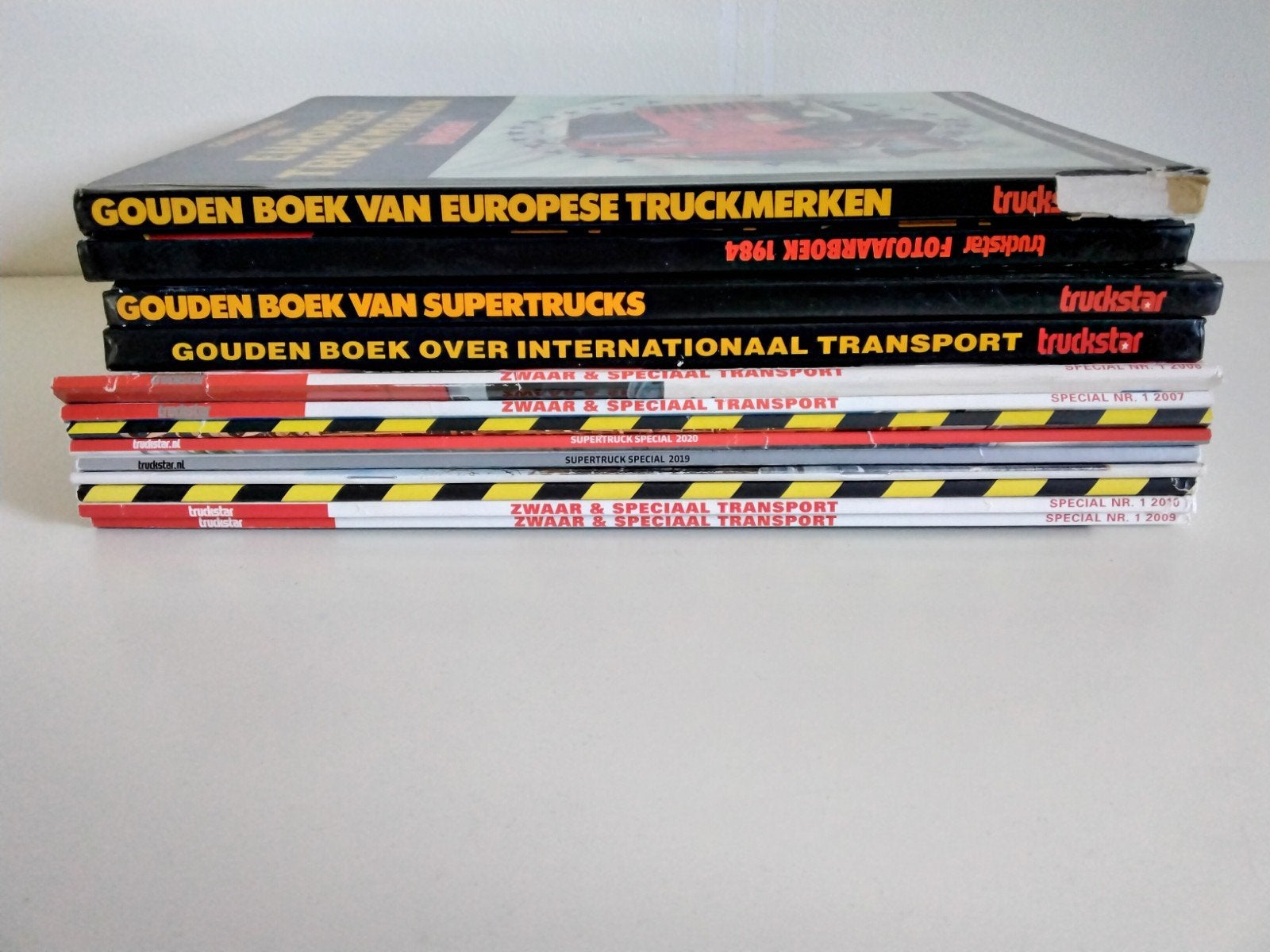 Truckstar boeken en specials - Gouden Boek & Zwaar Transport, Boeken, Ophalen of Verzenden, Gelezen, Algemeen, Truckstar Redactie