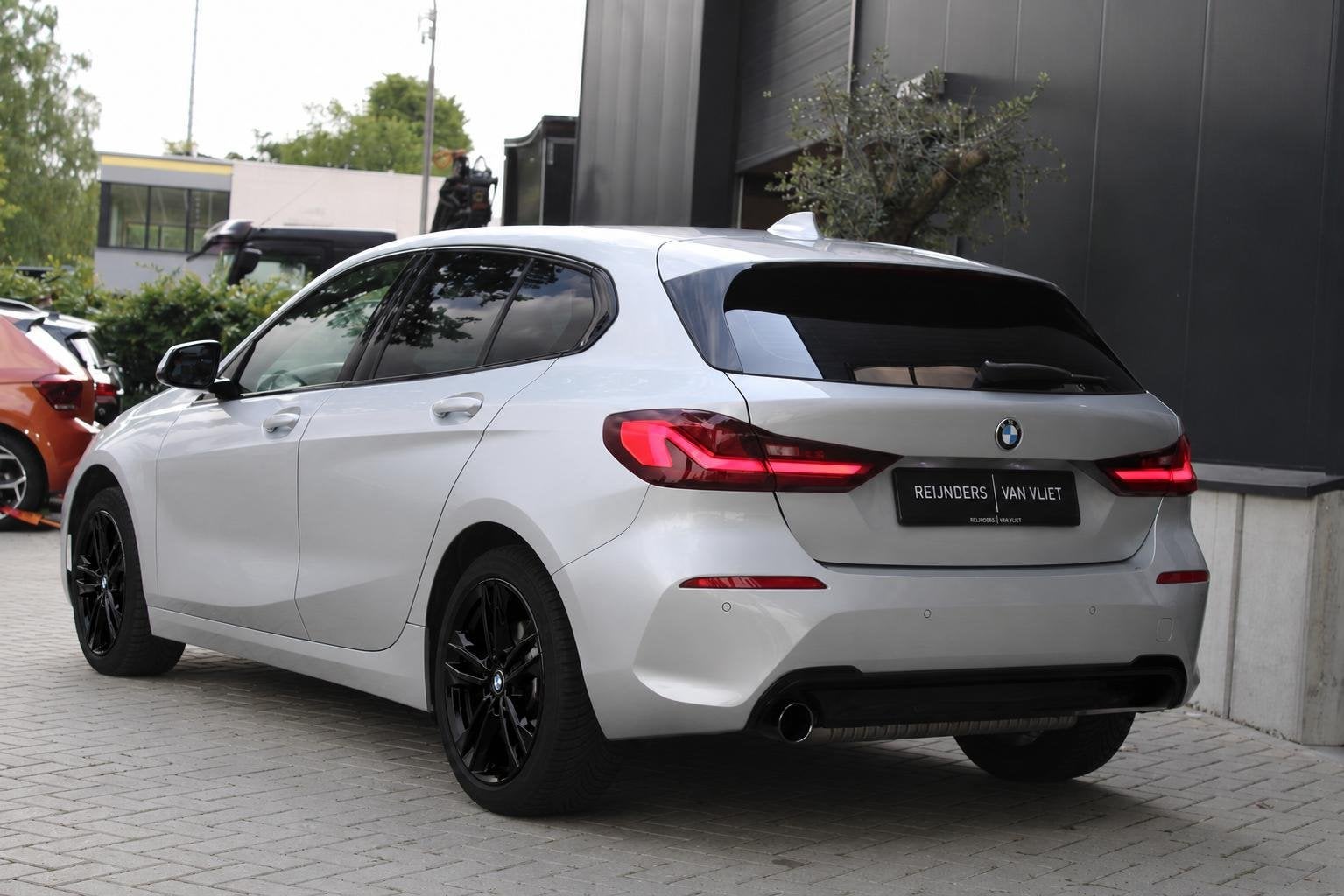 BMW 1-serie 118i High Executive | Sport Line | Black Pack |, Auto's, 12 maanden, 136 pk, Gebruikt, Leder en Stof