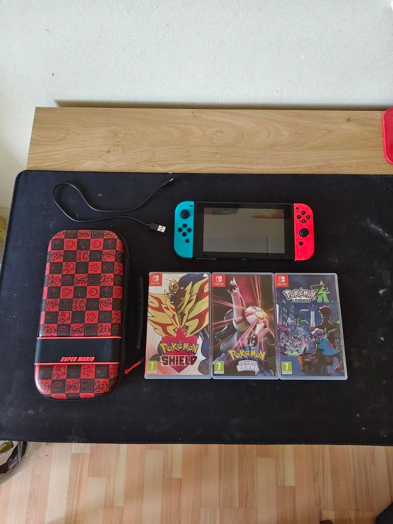 Nintendo Switch + 3 Pokémon Games Met Dock, Case en Joycons, Spelcomputers en Games, Spelcomputers | Nintendo Switch, Nintendo