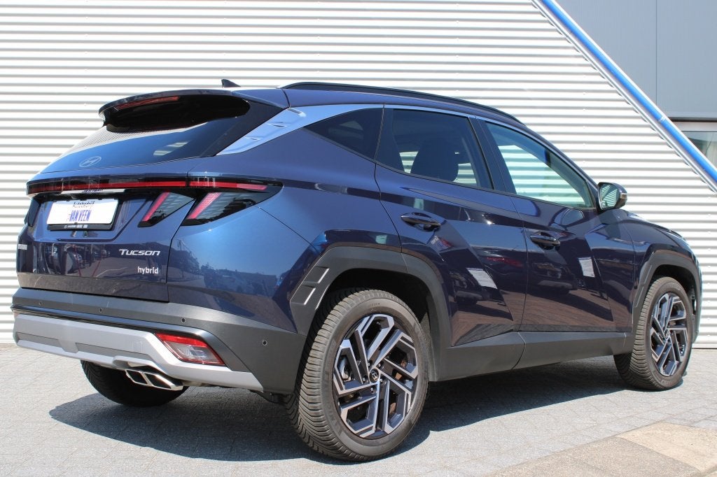 Hyundai Tucson 1.6 T-GDI HEV Premium Sky | Leer | Full Led |, Auto's, Dealer onderhouden, Gebruikt, Zwart, 4 cilinders