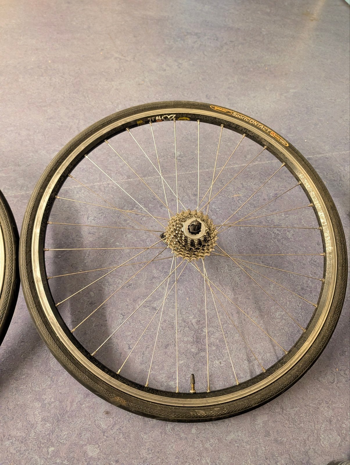 26-inch fietswielen met Continental banden en cassette, Ophalen