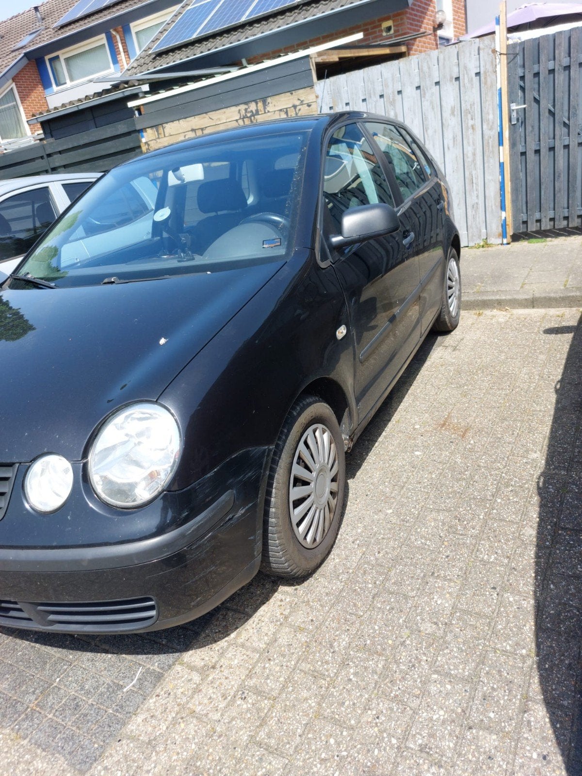 Volkswagen Polo 1.4 55KW AUT 2003 Zwart, Auto's, 74 pk, Origineel Nederlands, Particulier, 1000 kg