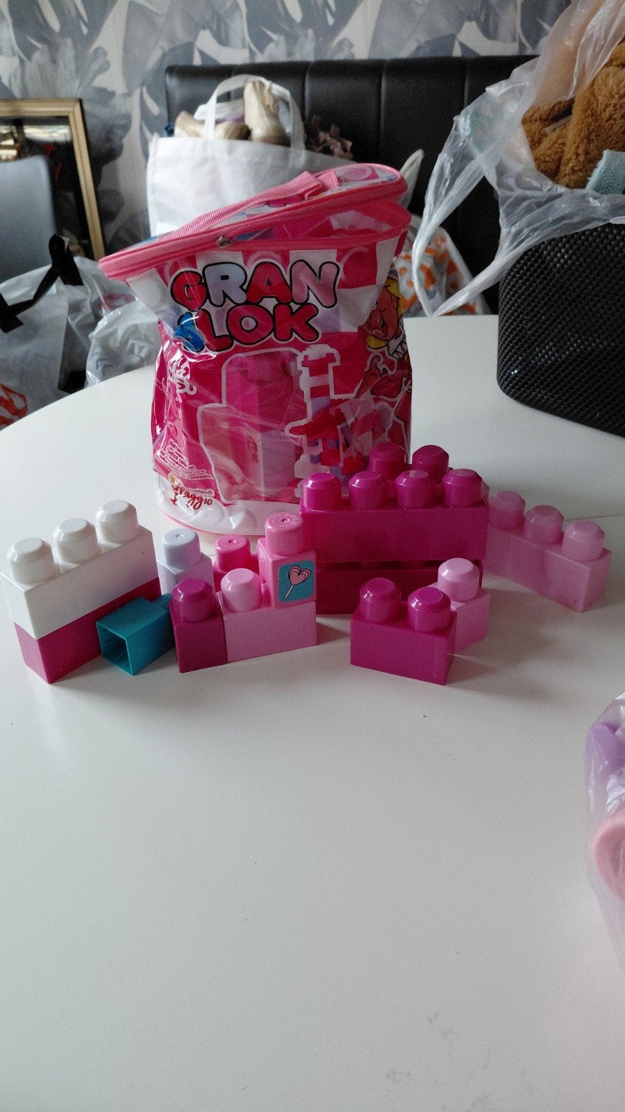 tasje met bouwblokken unicorn, Ophalen
