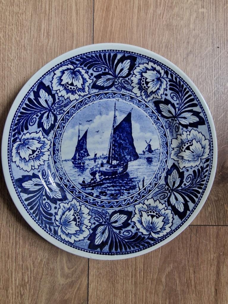 Delft blauw ophangbord, Ophalen