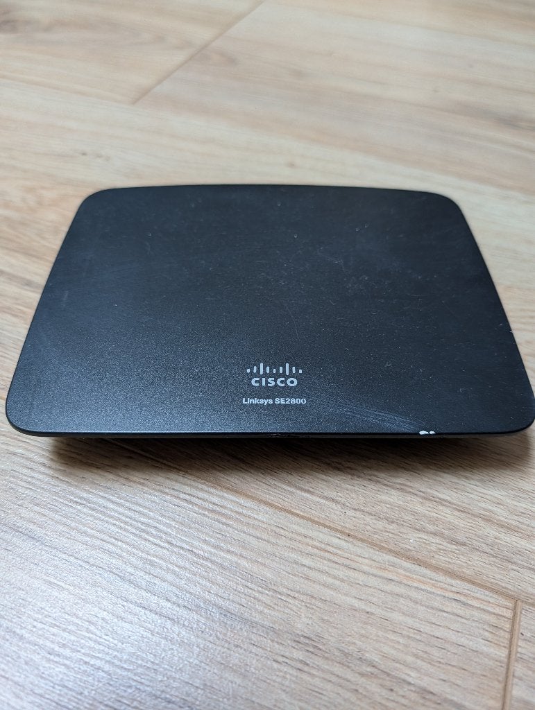 Linksys SE2800 switch / router, Computers en Software, Routers en Modems, Gebruikt, Router, Ophalen