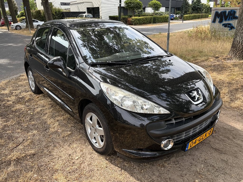 Peugeot 207 Zwart 1.4 | 128.800 km | Schuifdak | APK 07-2027, Voorwielaandrijving, Dealer onderhouden, Stof, Zwart
