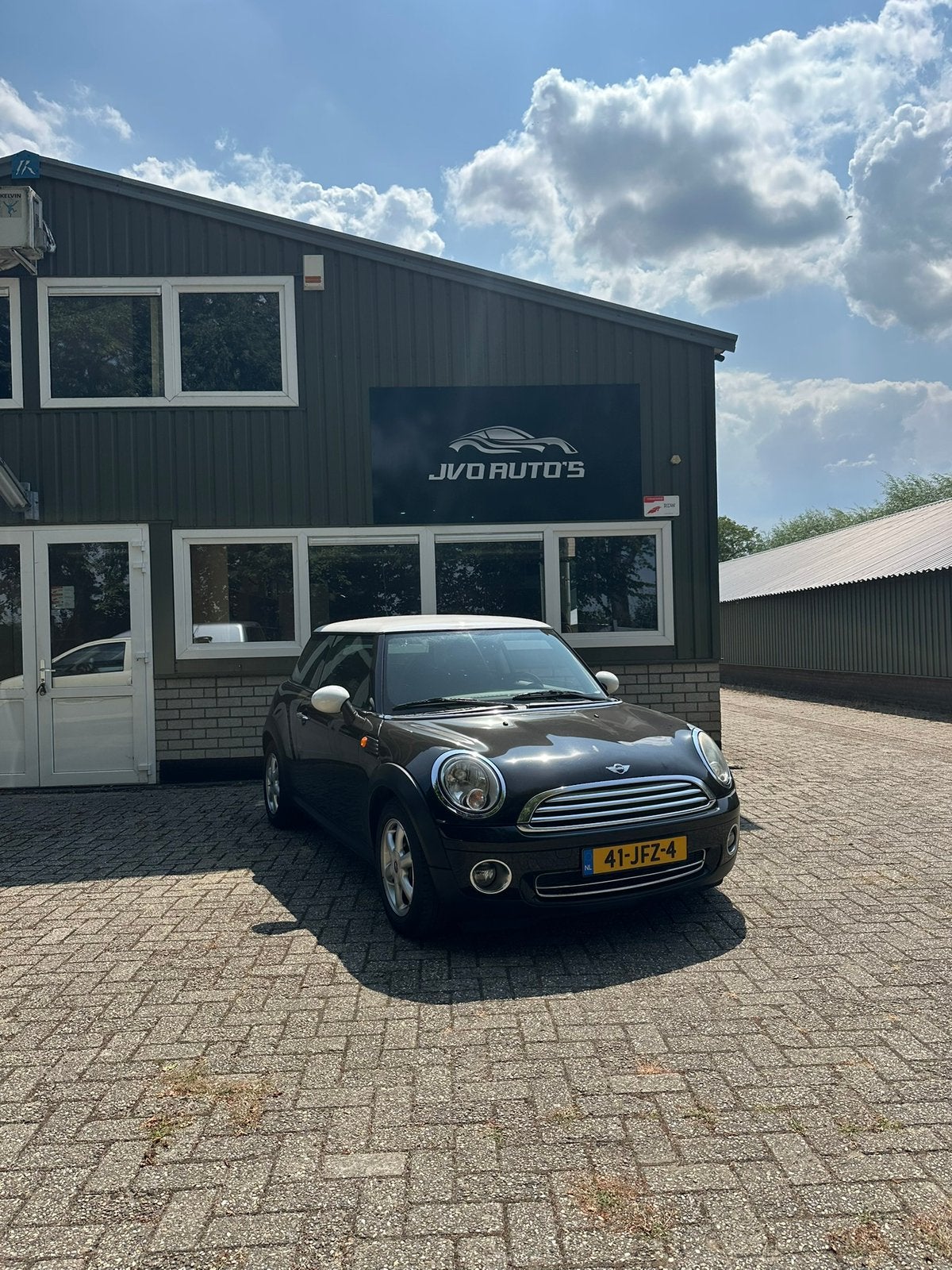 Mini 1.6 16V Cooper 88KW 2009 Zwart, Voorwielaandrijving, 750 kg, 4 cilinders, 4 stoelen