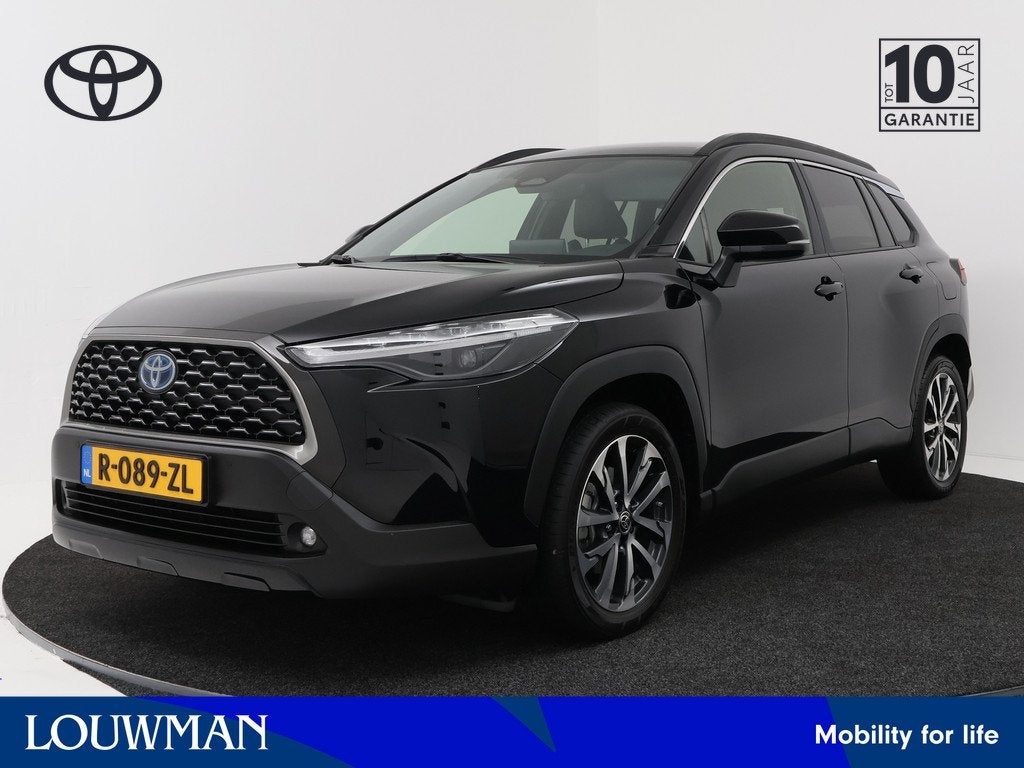 Toyota Corolla Cross 2.0 High Power Hybrid First Edition | N, Auto's, Toyota, 12 maanden, Gebruikt, 4 cilinders, Leder en Stof