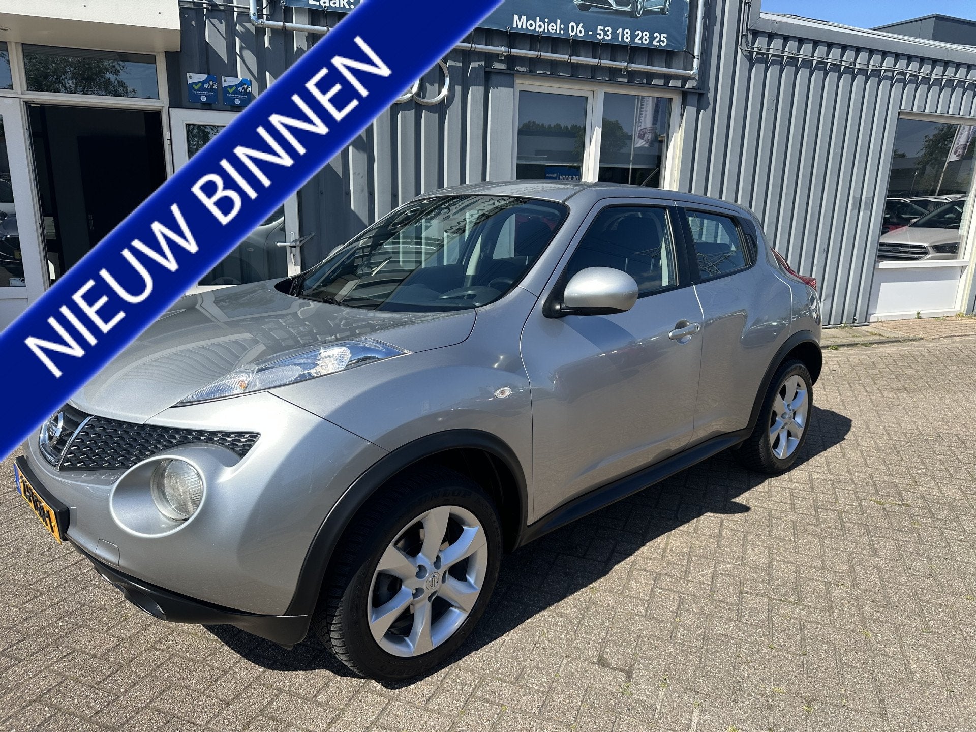 Nissan Juke 1.6 Acenta Eco (bj 2012), Euro 5, Stof, Zwart, 4 cilinders