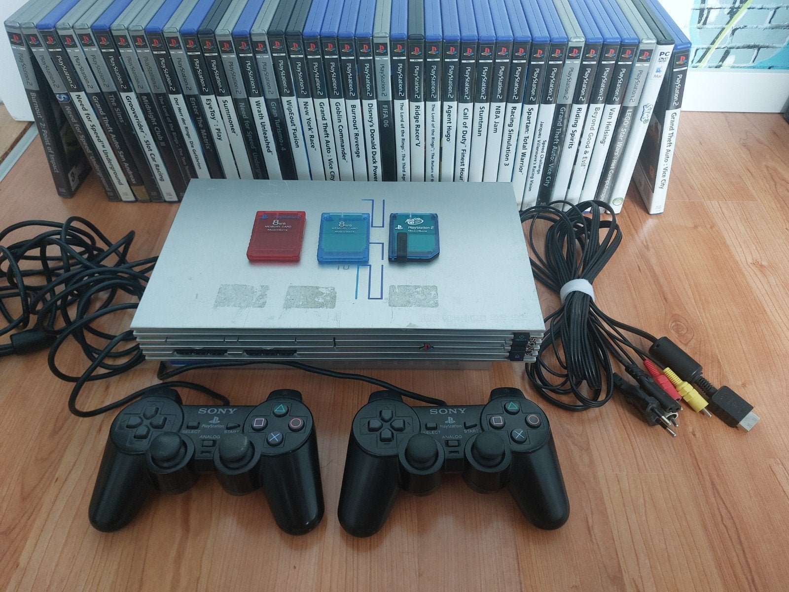 PlayStation 2 met controllers, memory cards en veel games, Ophalen, Gebruikt, Phat, Met games