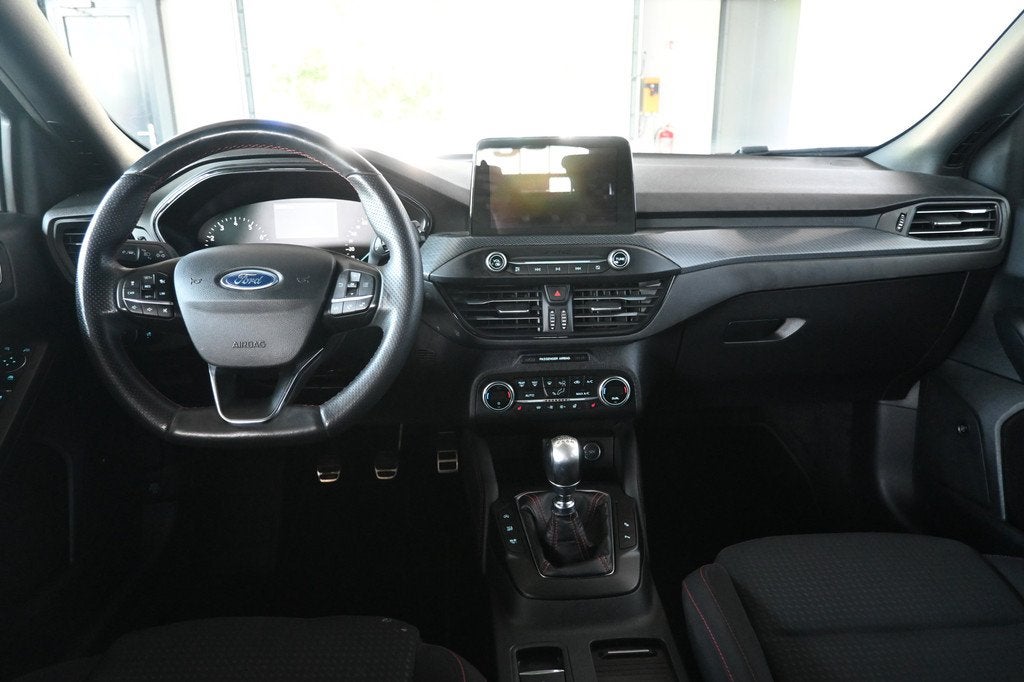 Ford Focus 1.0 EcoBoost ST Line Business Clima CarPlay Camer, Stof, Gebruikt, Met garantie (alle), Zwart