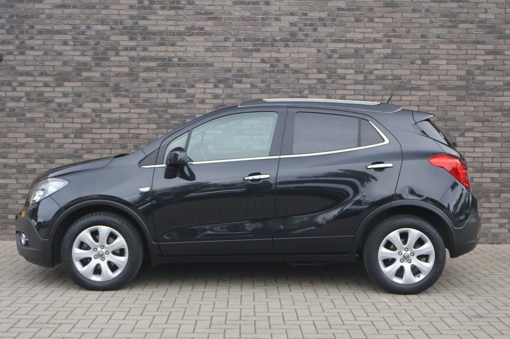 Opel Mokka 1.4 T Cosmo 4x4 | Camera | Trekhaak | Schuifdak |, Auto's, Opel, Euro 5, 1325 kg, Gebruikt, 4 cilinders