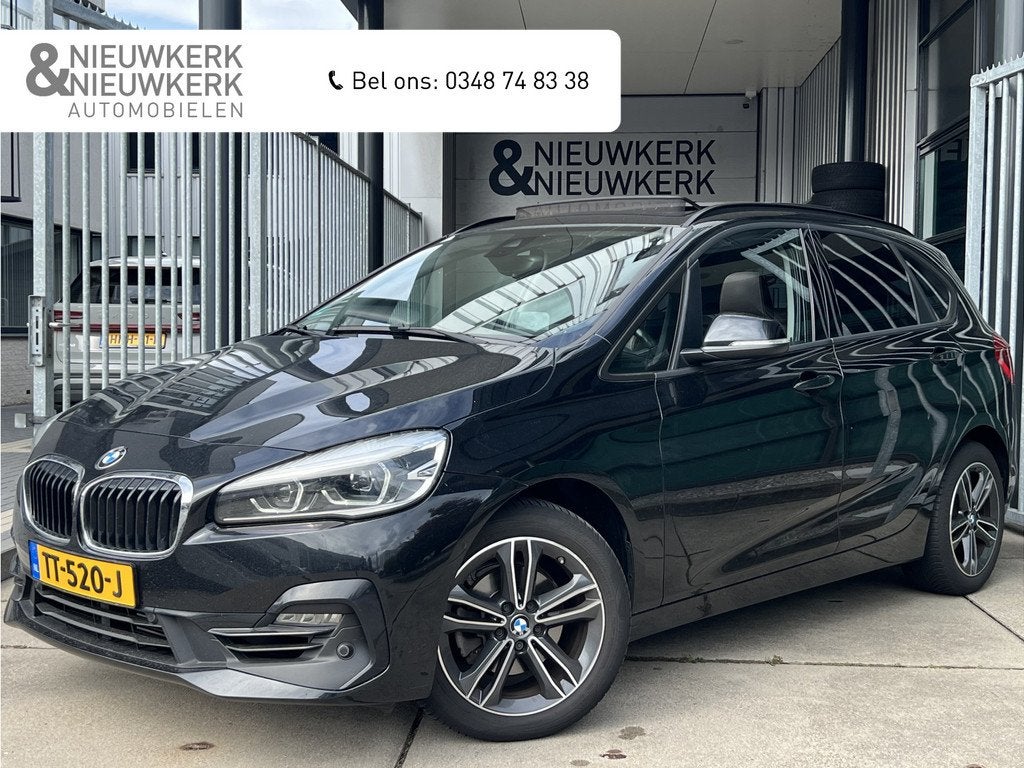 BMW 2 Serie Active Tourer 218i High Executive | AUTOMAAT | P, Auto's, BMW, Gebruikt, Met garantie (alle), Zwart, 3 cilinders