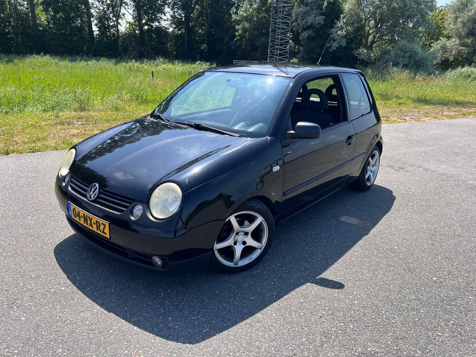 Volkswagen Lupo 1.4 44KW 2004 Zwart, Voorwielaandrijving, Bluetooth, 4 cilinders, 4 stoelen