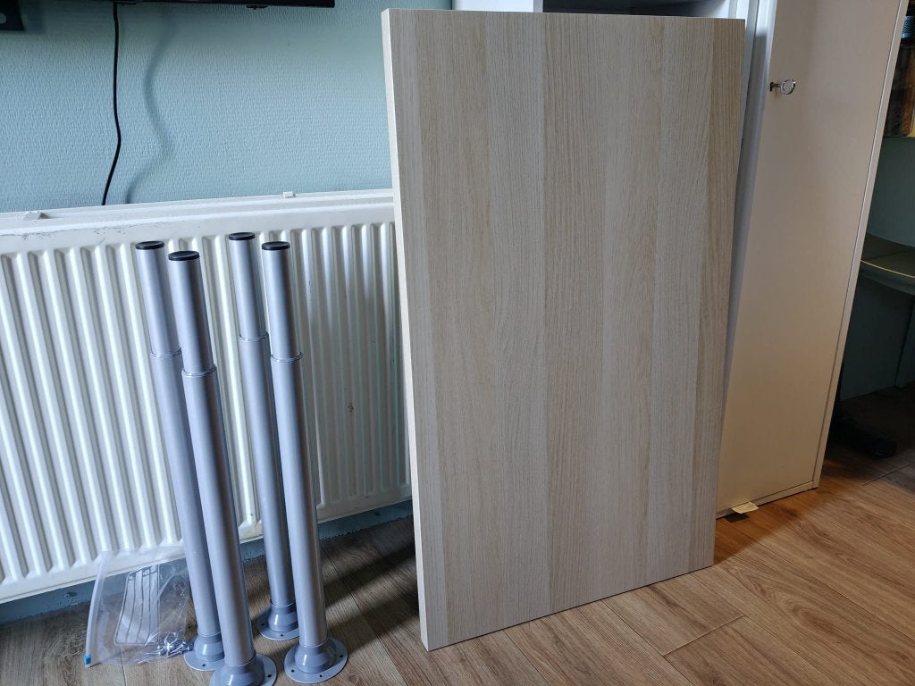 IKEA bureau 100 x 60 met verstelbare poten, Ophalen, In hoogte verstelbaar, Zo goed als nieuw, IKEA