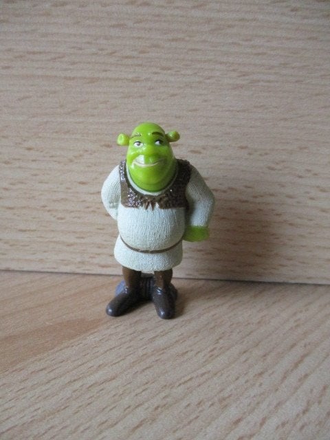 Shrek poppetje 5cm met bordje achter z'n rug, Ophalen of Verzenden, Zo goed als nieuw