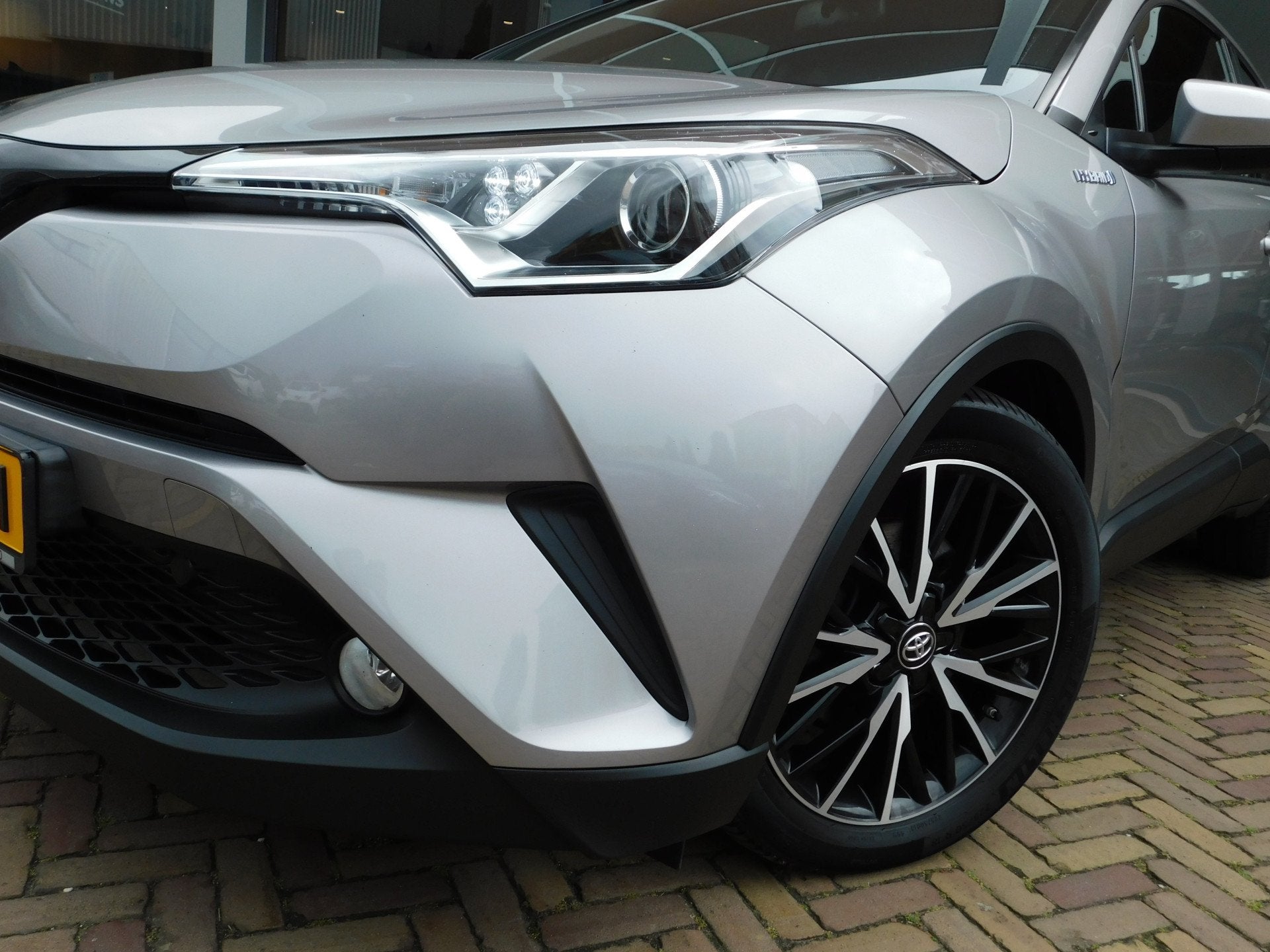 Toyota C-HR 1.8 Hybrid Dynamic (bj 2018, automaat), Auto's, Stof, Euro 6, 4 cilinders, 26 km/l