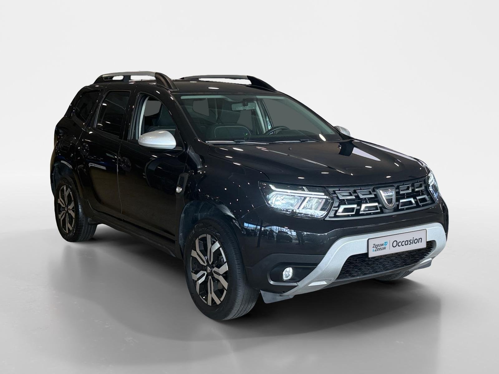 Dacia Duster 1.3 TCe Prestige *Navi+Camera*Climate*Trekhaak*, Auto's, Stof, Gebruikt, 4 cilinders, Zwart