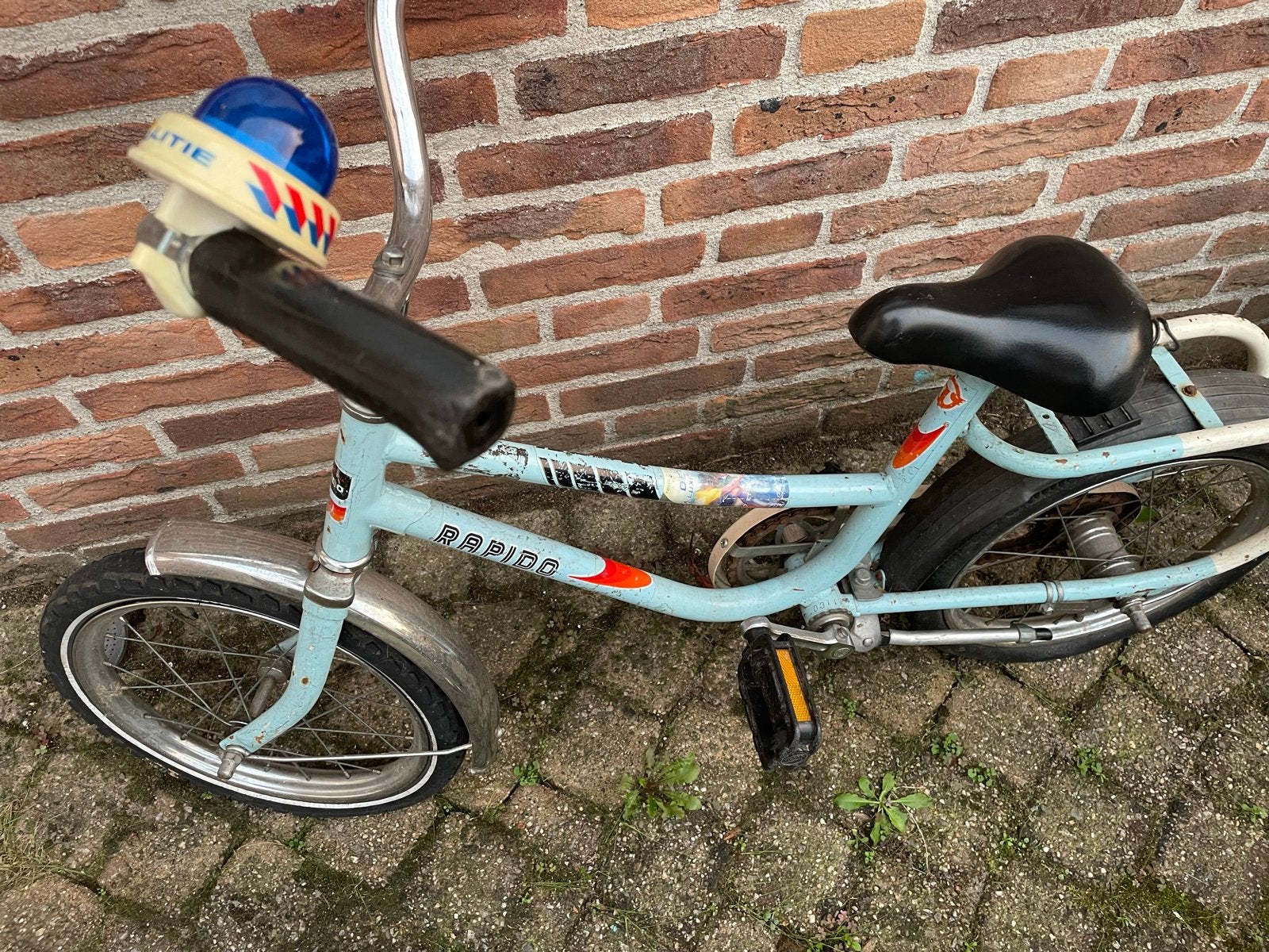 Rapido kinderfiets - Blauw met politie sirene, Fietsen en Brommers, Ophalen, Gebruikt, Terugtraprem, Minder dan 16 inch
