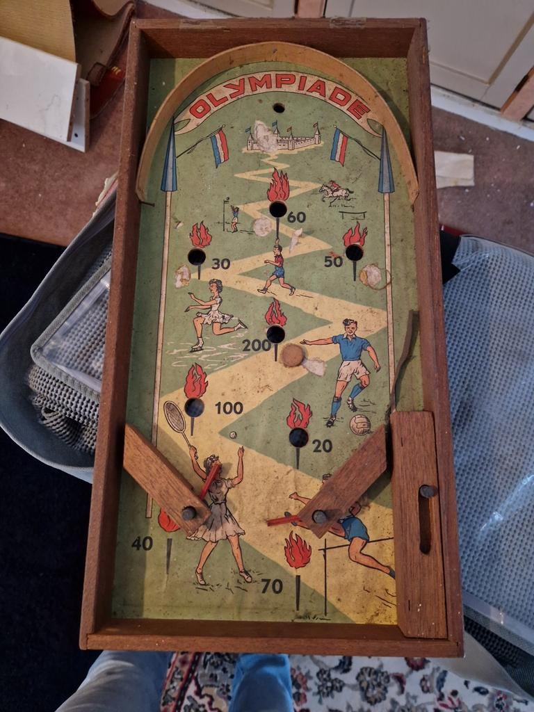 Oud Hollands Knikkerbord Olympiade, Ophalen