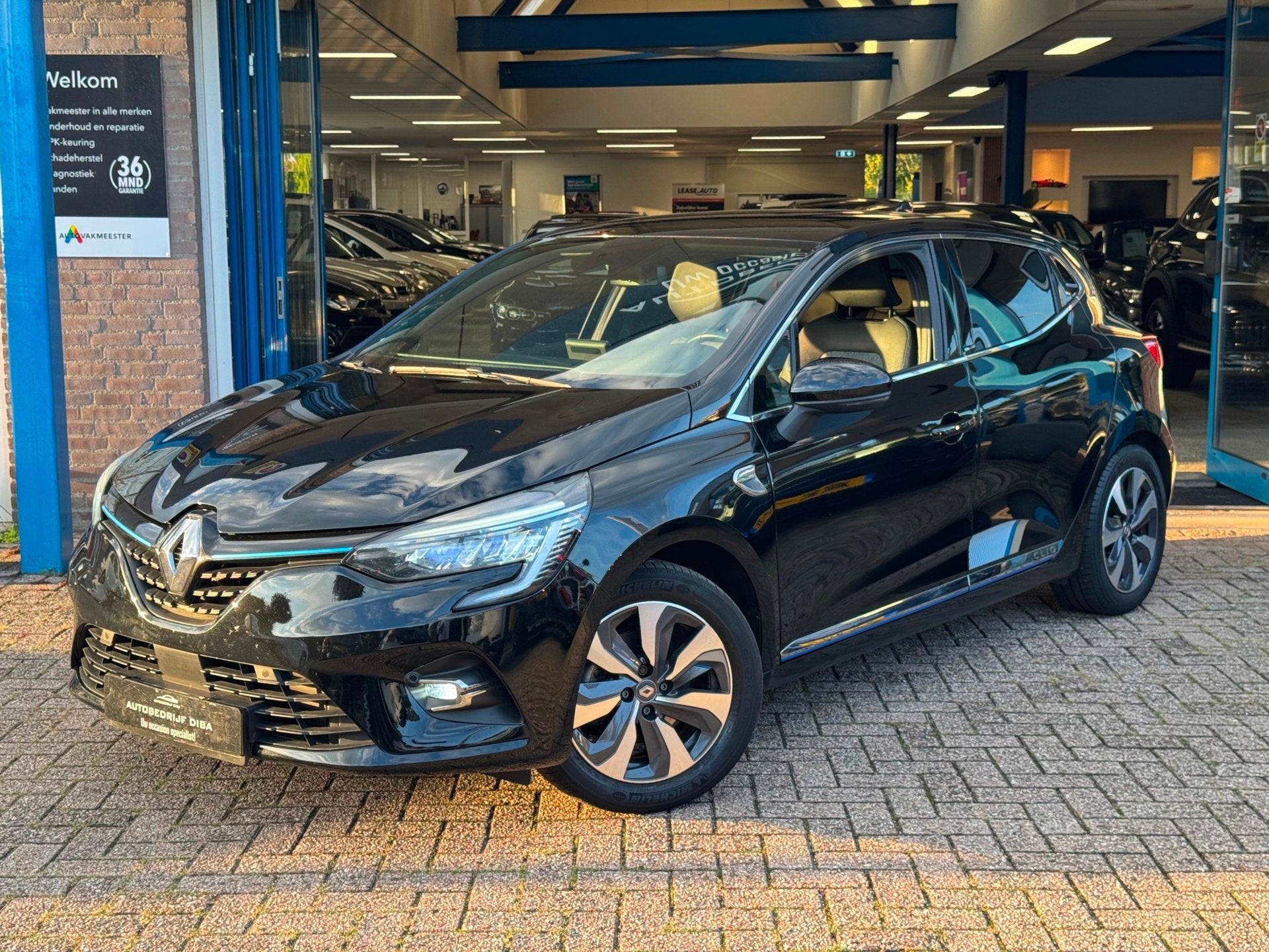 Renault Clio 1.6 E-Tech Hybrid 140 R.S. Line AUT NAVI NAP, Dealer onderhouden, 28 km/l, Gebruikt, Leder en Stof
