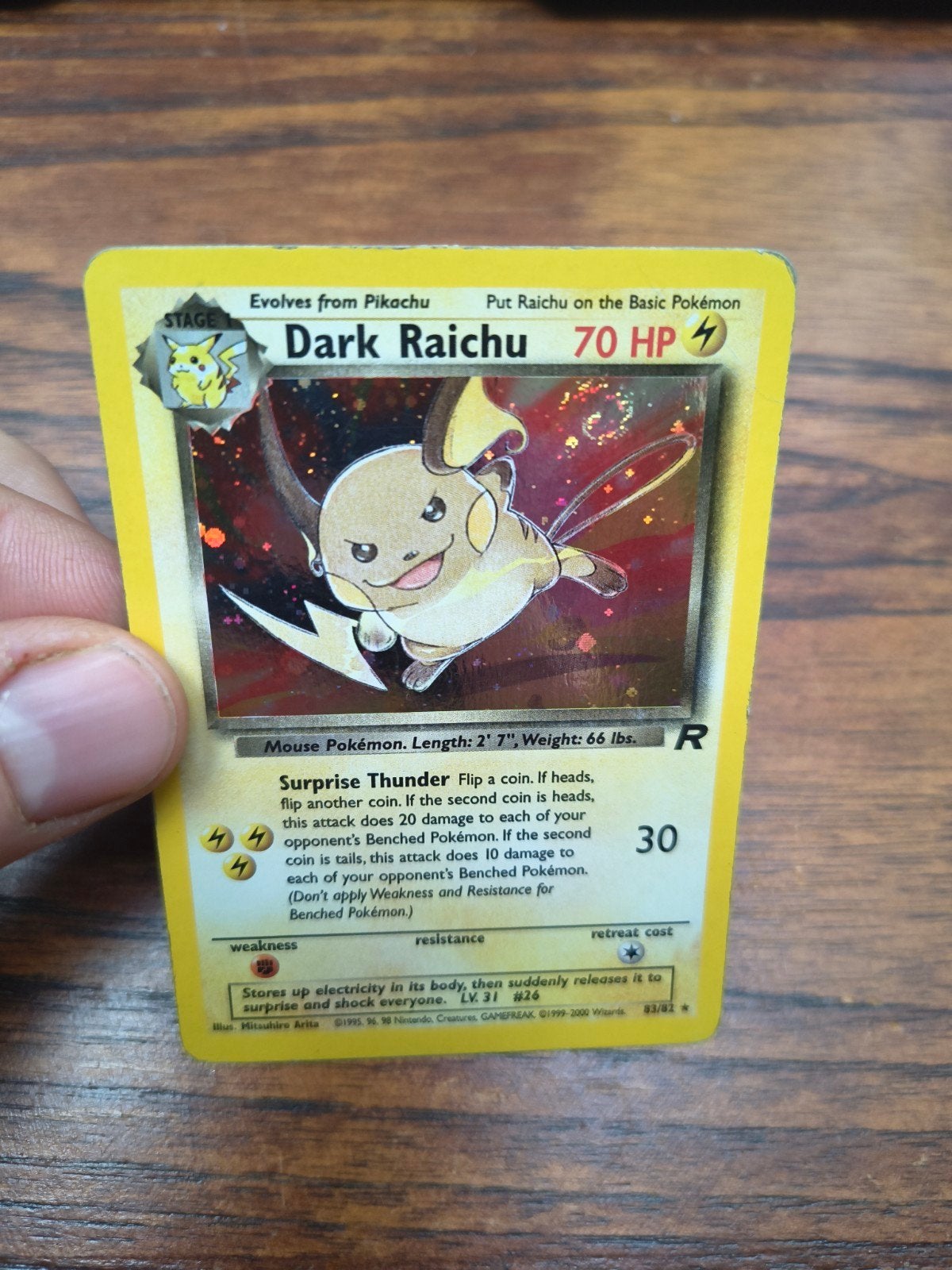 Dark Raichu Holo Pokémon kaart met swirl, Ophalen of Verzenden, Zo goed als nieuw, Losse kaart, Foil
