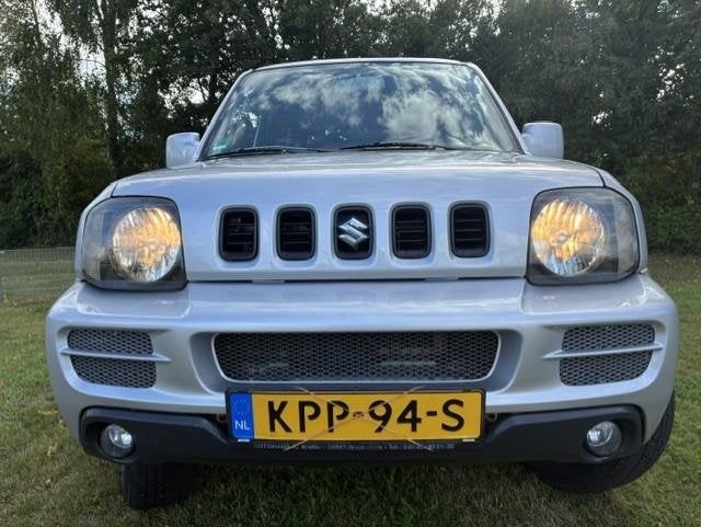 Suzuki Jimny 1.3 Exclusive AIRCO/TREKHAAK/NIEUWE APK!, Auto's, Euro 5, Gebruikt, 4 stoelen, 14 km/l