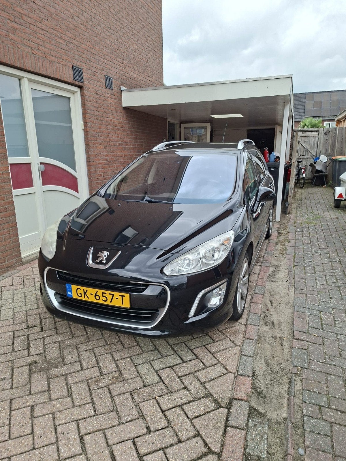 Peugeot 308 1.6 THP 115KW SW 5PL 2012 Zwart, Voorwielaandrijving, 7 stoelen, Zwart, 14 km/l