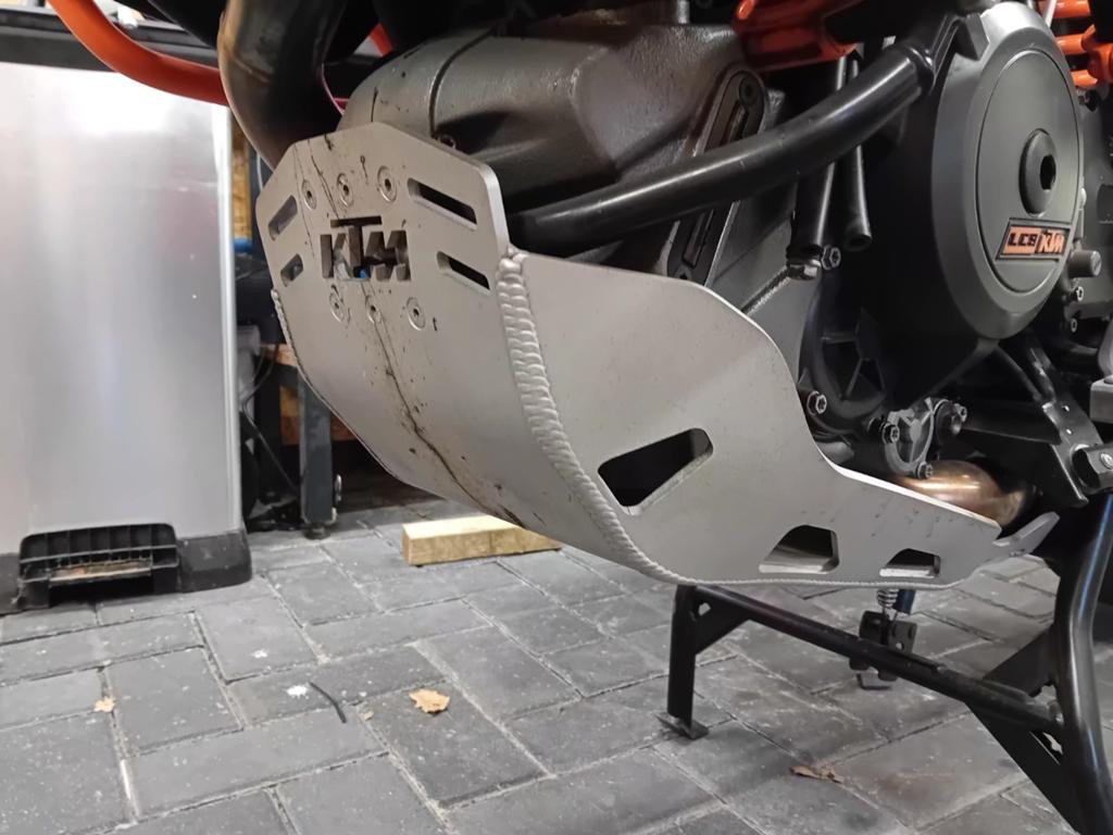 KTM Originele Carterplaat 1050/1090/1190/1290 Adventure, Motoren, Onderdelen | Overige, Ophalen of Verzenden