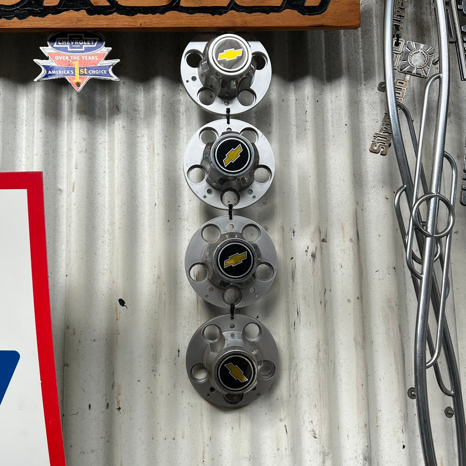 4 stuks nog in goede staat wielnaaf caps hub chevrolet, Ophalen of Verzenden, Zo goed als nieuw