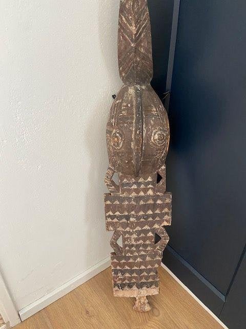 afrikaans masker, Ophalen