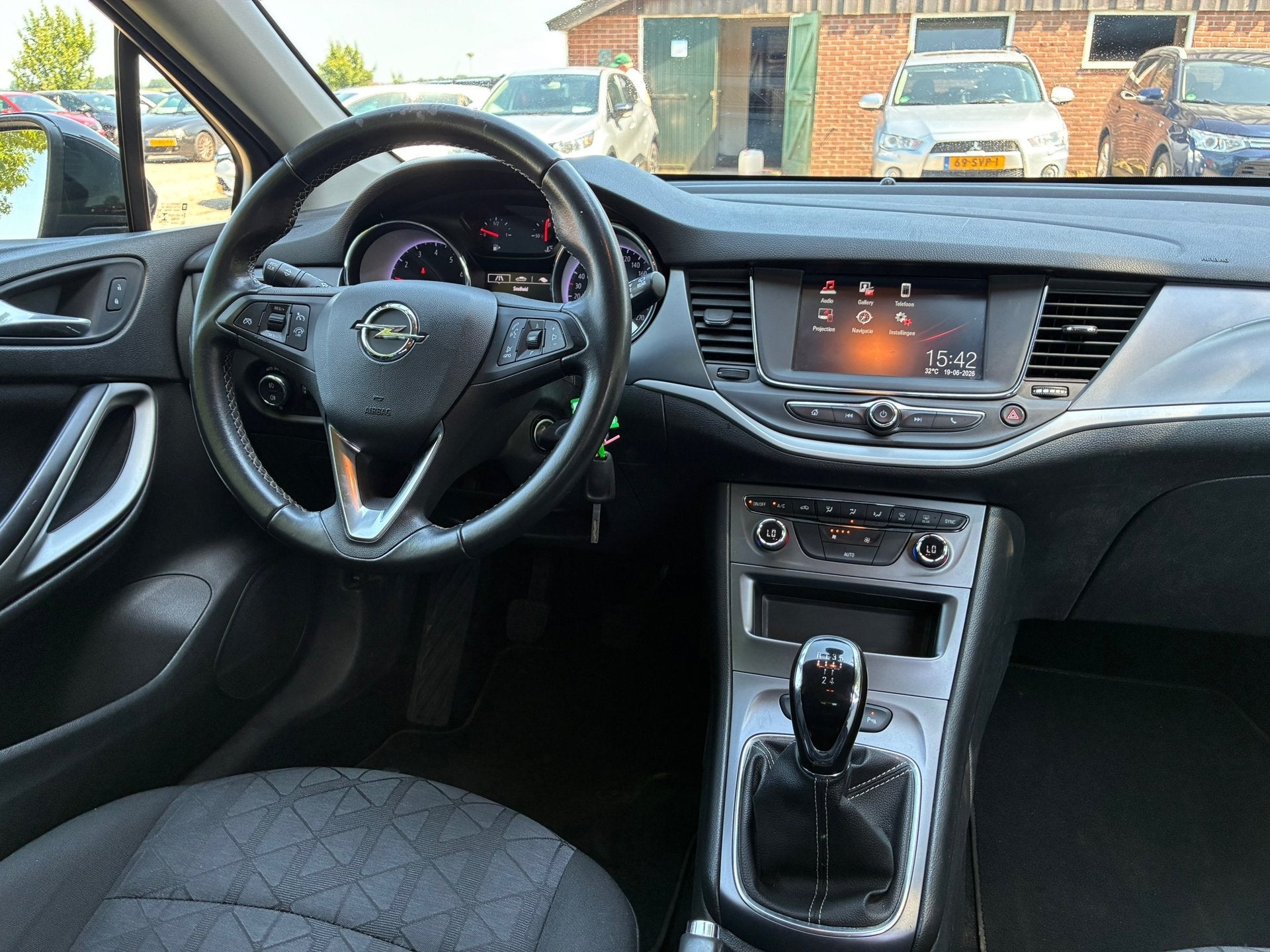 Opel Astra Sports Tourer 1.0 Turbo 120 Jaar Edition | Navi +, Stof, Gebruikt, 1178 kg, 620 kg