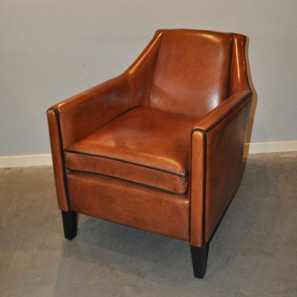 Strakke schapenleren fauteuil (nieuwstaat), Huis en Inrichting, Fauteuils, Ophalen, Zo goed als nieuw, 50 tot 75 cm, Leer
