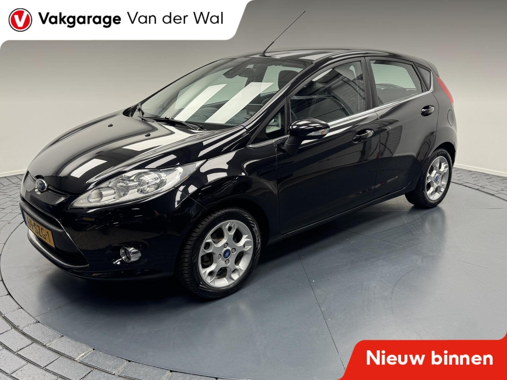 Ford Fiesta 1.25 Titanium Navigatie-Cr.contr-Clima-Parkeerse, Auto's, Voorwielaandrijving, Euro 5, Stof, Met garantie (alle)