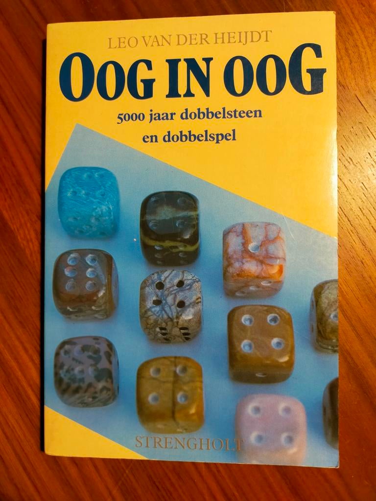 Oog in Oog - 5000 jaar dobbelsteen en dobbelspel (1990), Antiek en Kunst, Ophalen of Verzenden
