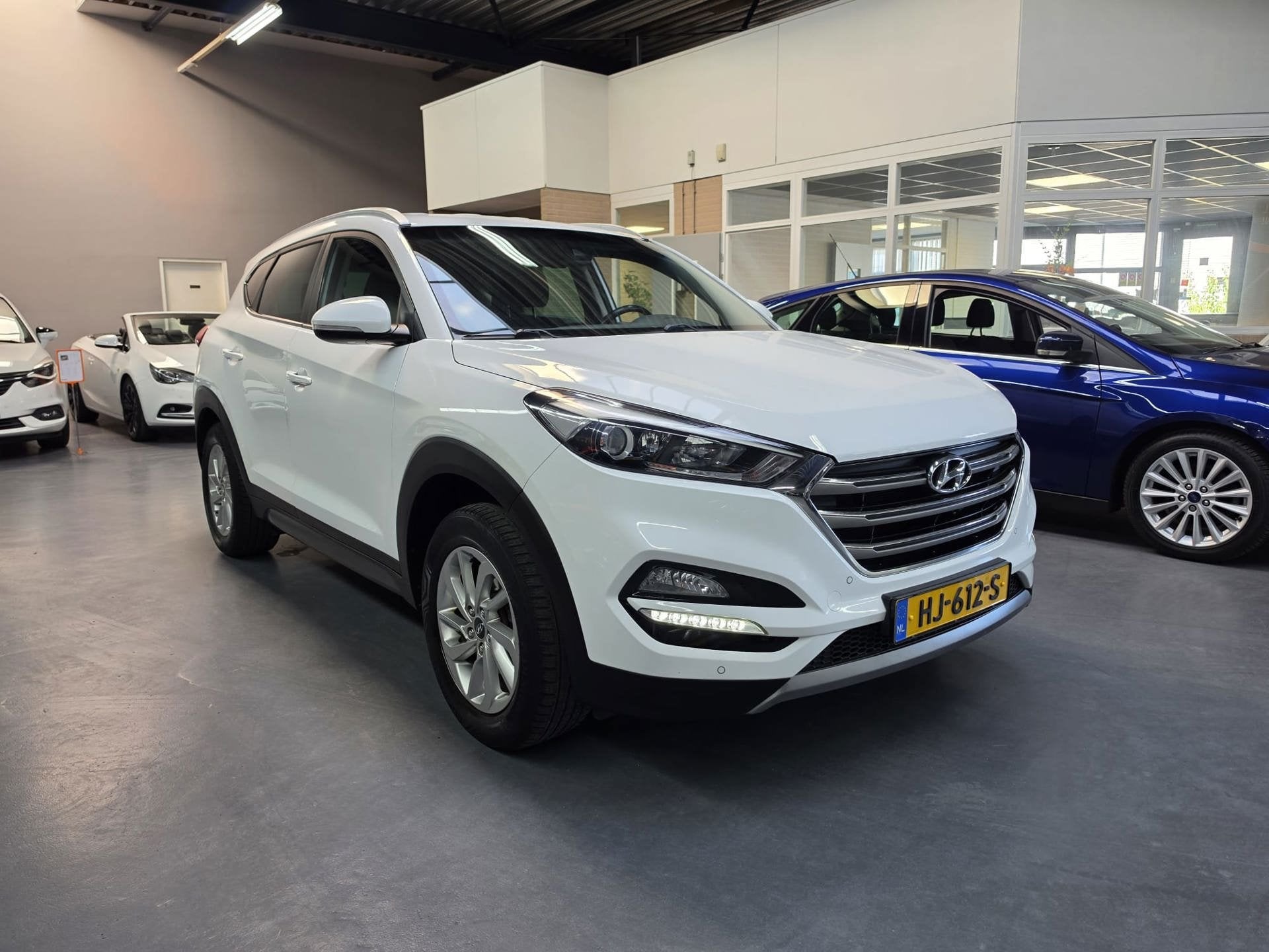 Hyundai Tucson 1.6 GDi Comfort CAMERA STOELVERWARMIN LED NAP, Auto's, Voorwielaandrijving, Dealer onderhouden, Gebruikt, 4 cilinders