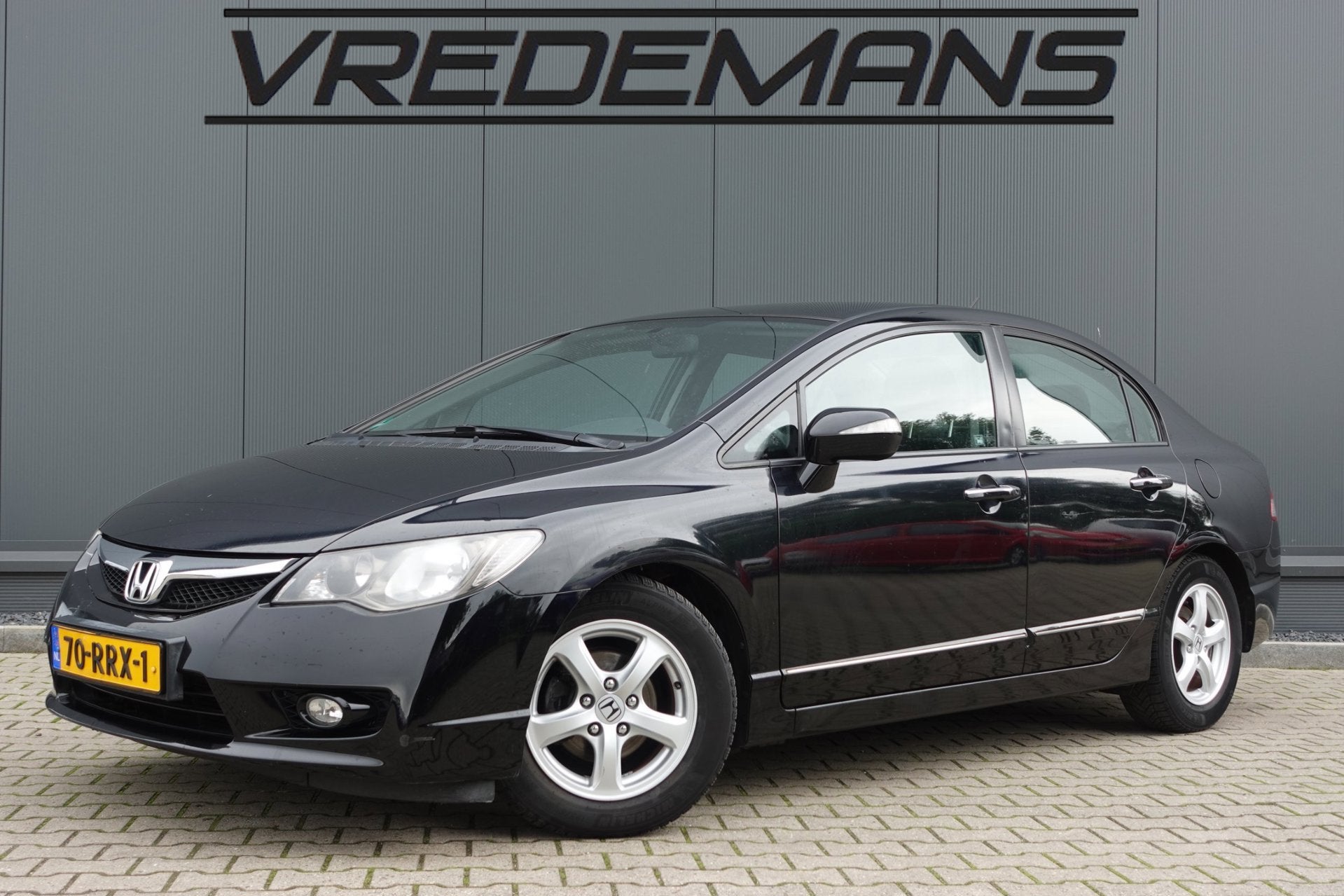 Honda Civic 1.3 Hybrid Elegance, Gebruikt, Metallic lak, Alcantara, Zwart