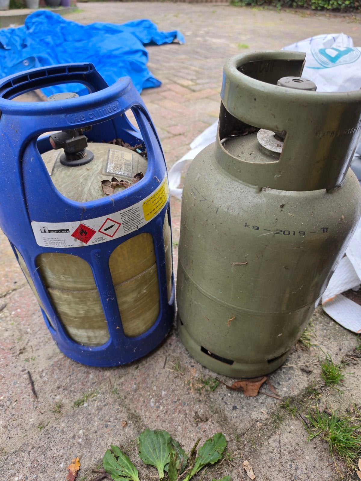 Kunststof en stalen gasfles, leeg, Ophalen, Gebruikt
