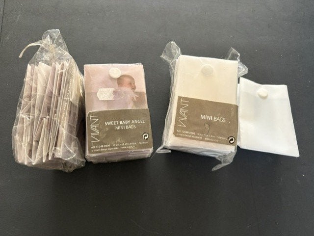 baby zakjes met print en wit alles samen, Kinderen en Baby's, Ophalen of Verzenden, Nieuw