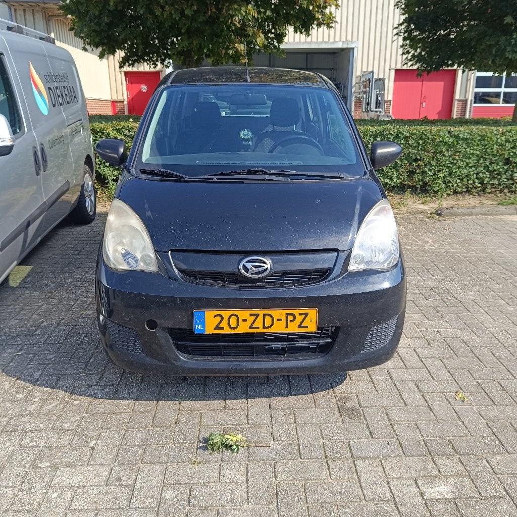 Daihatsu Cuore 1.0 5D 2008 Zwart, Auto's, Daihatsu, Voorwielaandrijving, Stof, 600 kg, Zwart