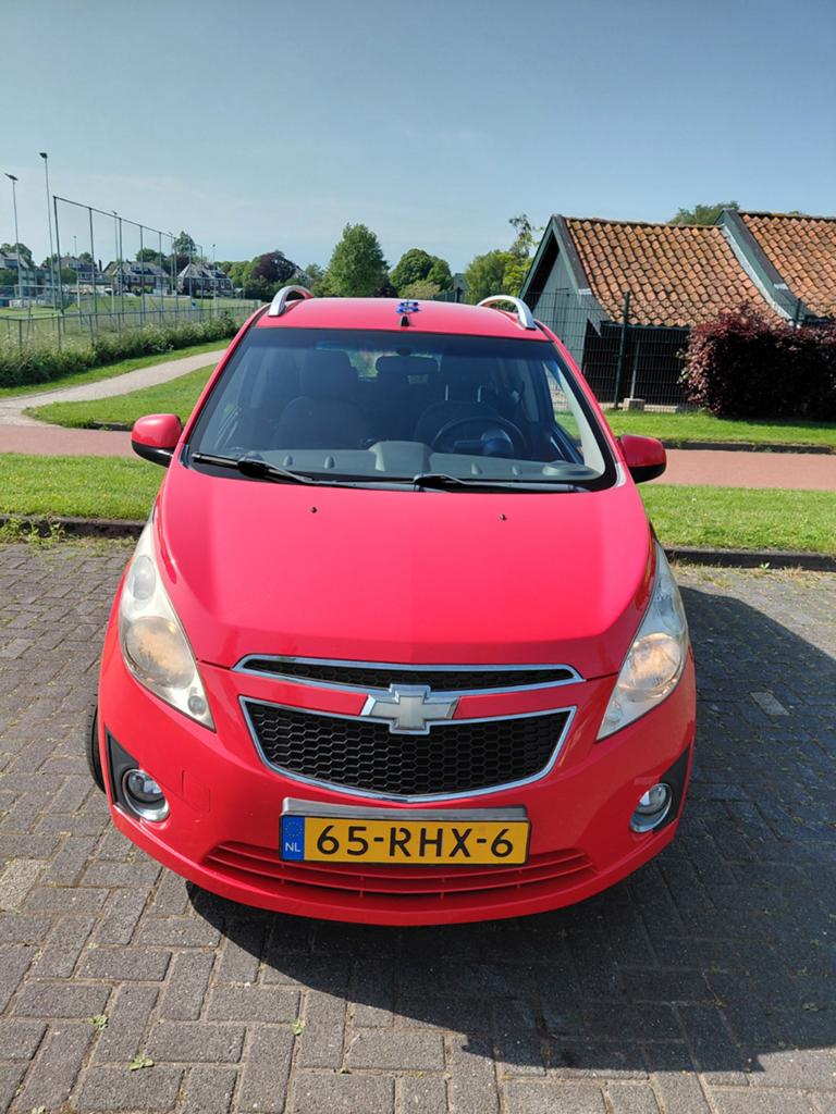 Chevrolet Spark 1.0  2011 Rood, Voorwielaandrijving, 839 kg, USB, 4 cilinders