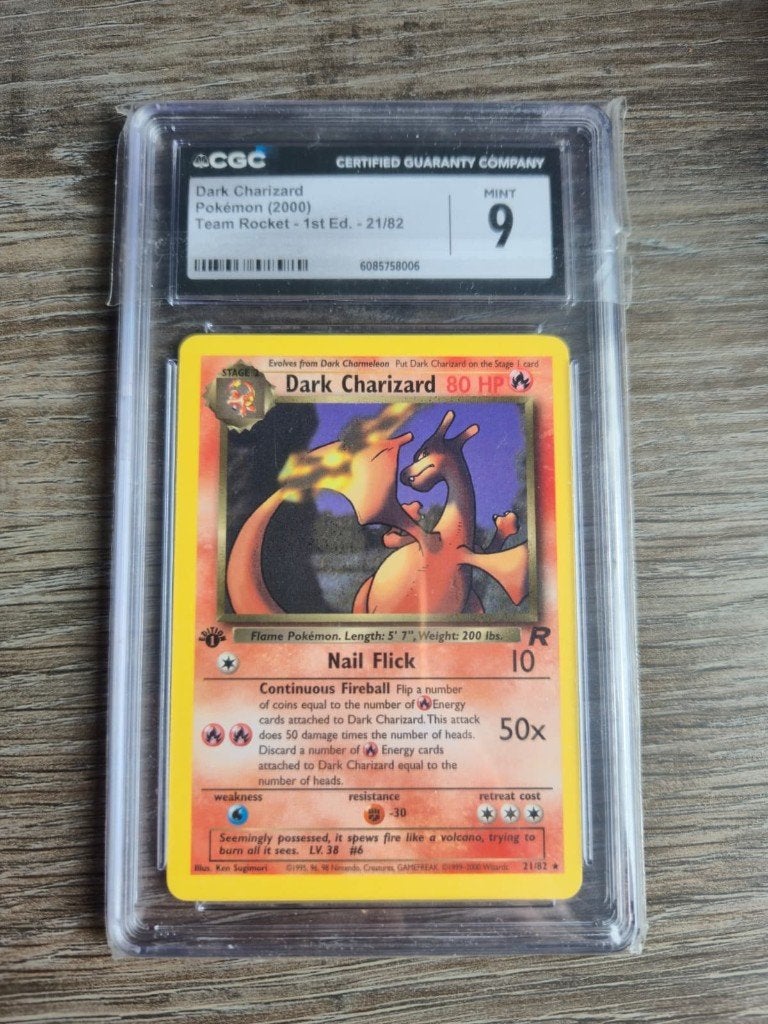 CGC 9 First Edition Dark Charizard Pokémon 2000 Team Rocket, Ophalen of Verzenden, Zo goed als nieuw, Losse kaart, Foil