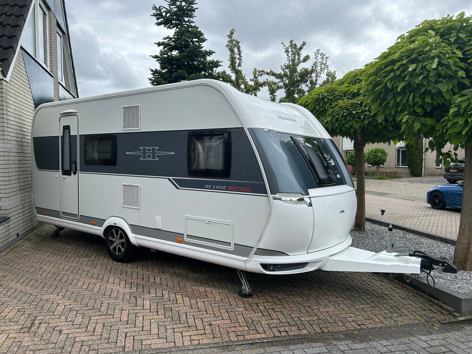 Hobby 490 KMF | Airco | Mover | Dorema voortentluifel, Caravans en Kamperen, Caravans, Hobby, Dwarsbed, Treinzit, Particulier