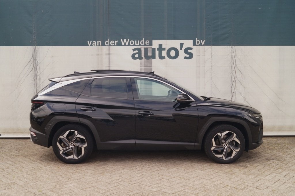 Hyundai Tucson 1.6 T-GDI PHEV Premium Sky -LEER-PANO-TREKHAA, Auto's, Automaat, 14 kWh, Gebruikt, Euro 6