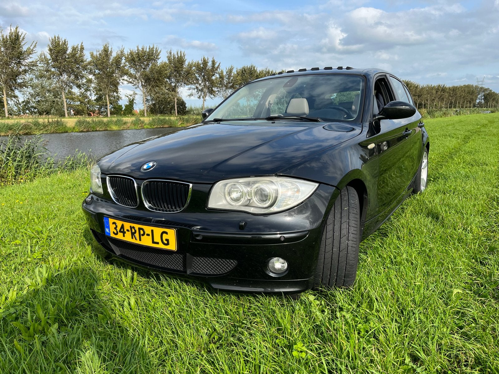 BMW 1-Serie 2.0 120I AUT 2005 Zwart, Achterwielaandrijving, 1995 cc, Beige, Zwart