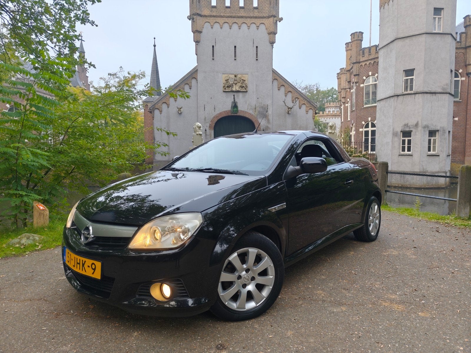 Opel Tigra 1.4 16V cabrio / 116.000 km / airco / NAP!!, Voorwielaandrijving, Dealer onderhouden, Stof, Zwart