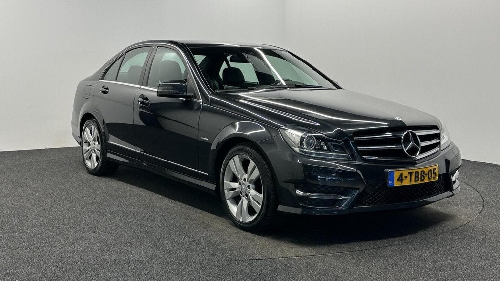 Mercedes-Benz C-klasse 180 Ambition Avantgarde AMG XENON TRE, Achterwielaandrijving, Met garantie (alle), Zwart, Sedan