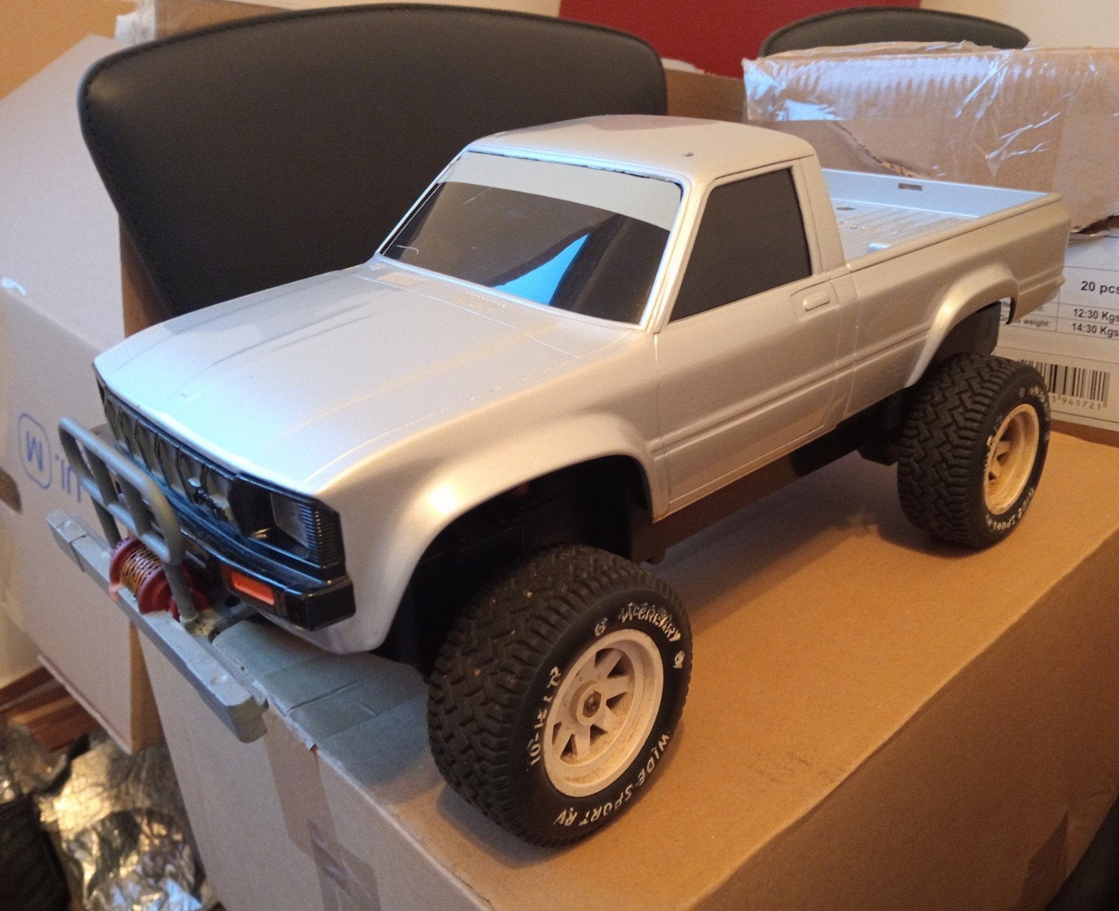 Vintage RC Toyota Hilux 1:10 Hobby, Ophalen of Verzenden, Auto offroad