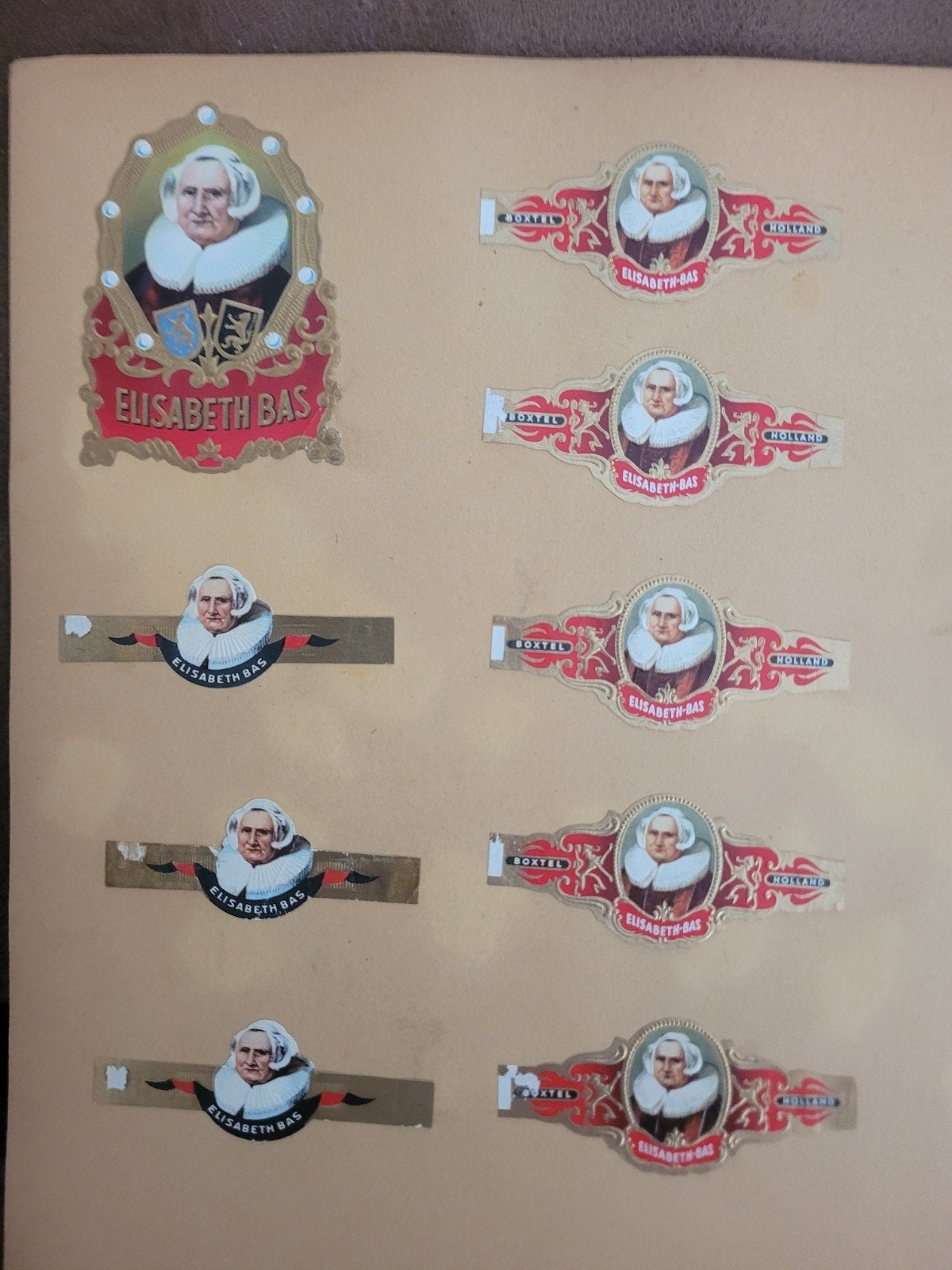 1 blad (2 zijden) met oude sigarenbandjes Elisabeth Bas, Ophalen of Verzenden, Gebruikt, Sigarenbandjes