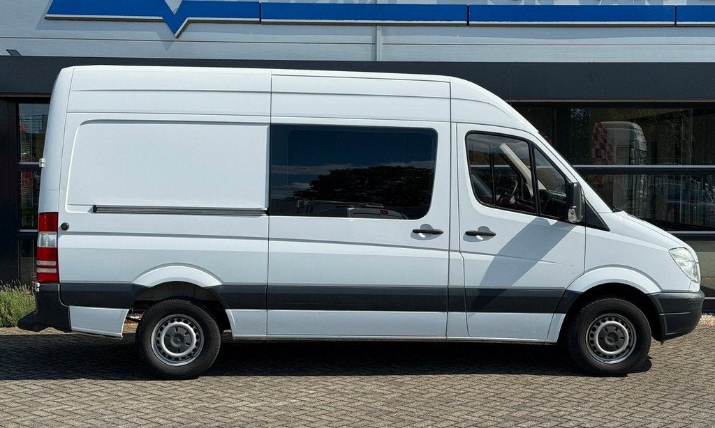 Mercedes-Benz Sprinter 310 2.2 CDI 366 HD DC L2H2 Airco NAP, Auto's, Euro 5, Gebruikt, Zwart, 2000 kg